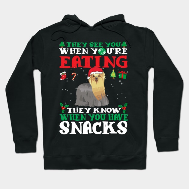 Christmas Dog Eating Snacks Hoodie by CyberpunkTees